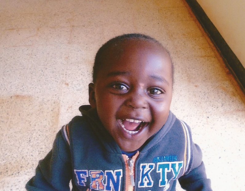 Smiling boy named Anselmo